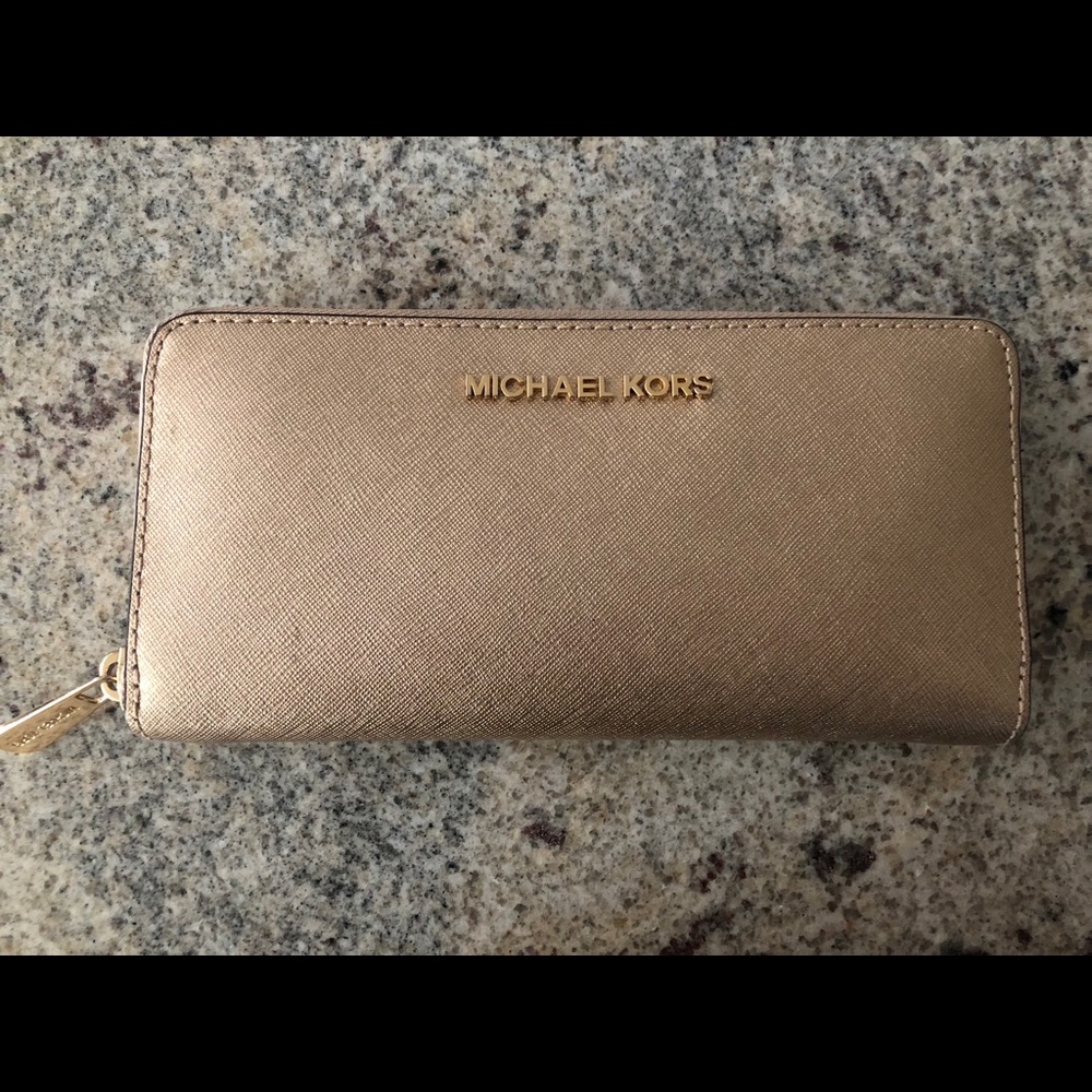 Michael Kors gold wallet with zipper